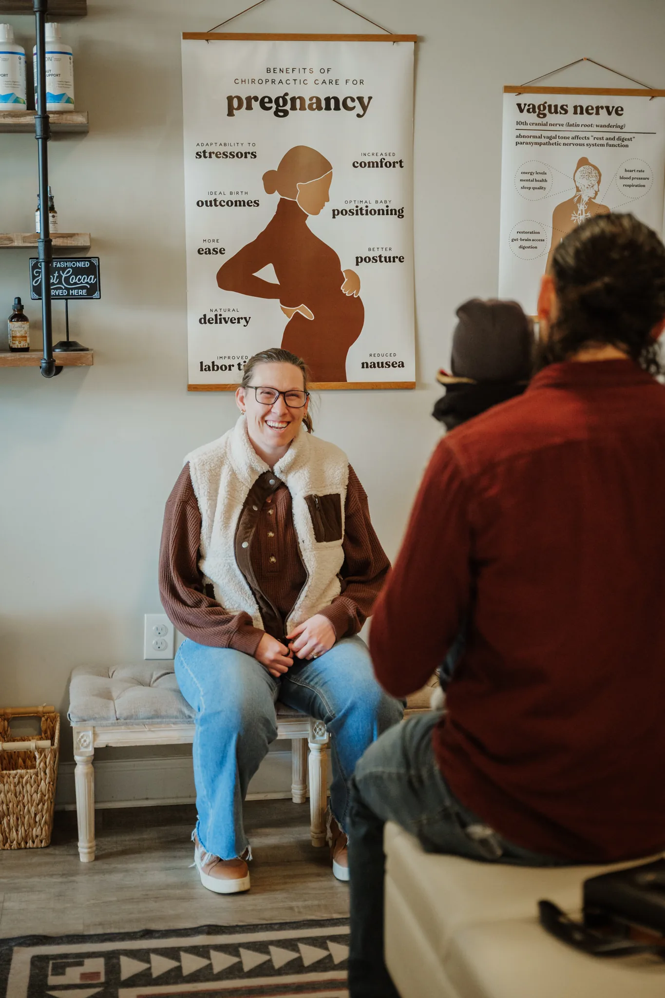 Doctor with smiling pregnant patient